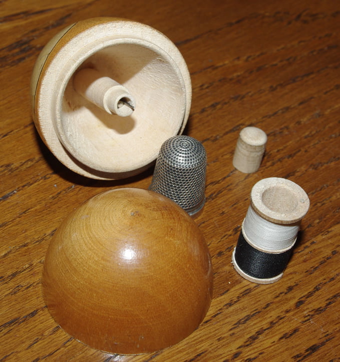 Mauchline ware Egg Shaped Etui "Cowes, Isle of Wight" and Egg Cup "Weston-super-Mare".