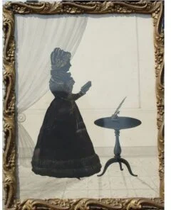 Silhouette, Lady facing Right with Book and Table